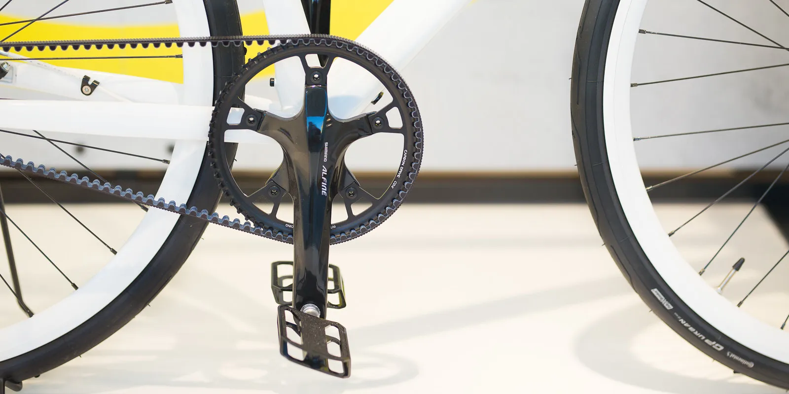 Rider pedaling a single-speed bicycle on the road