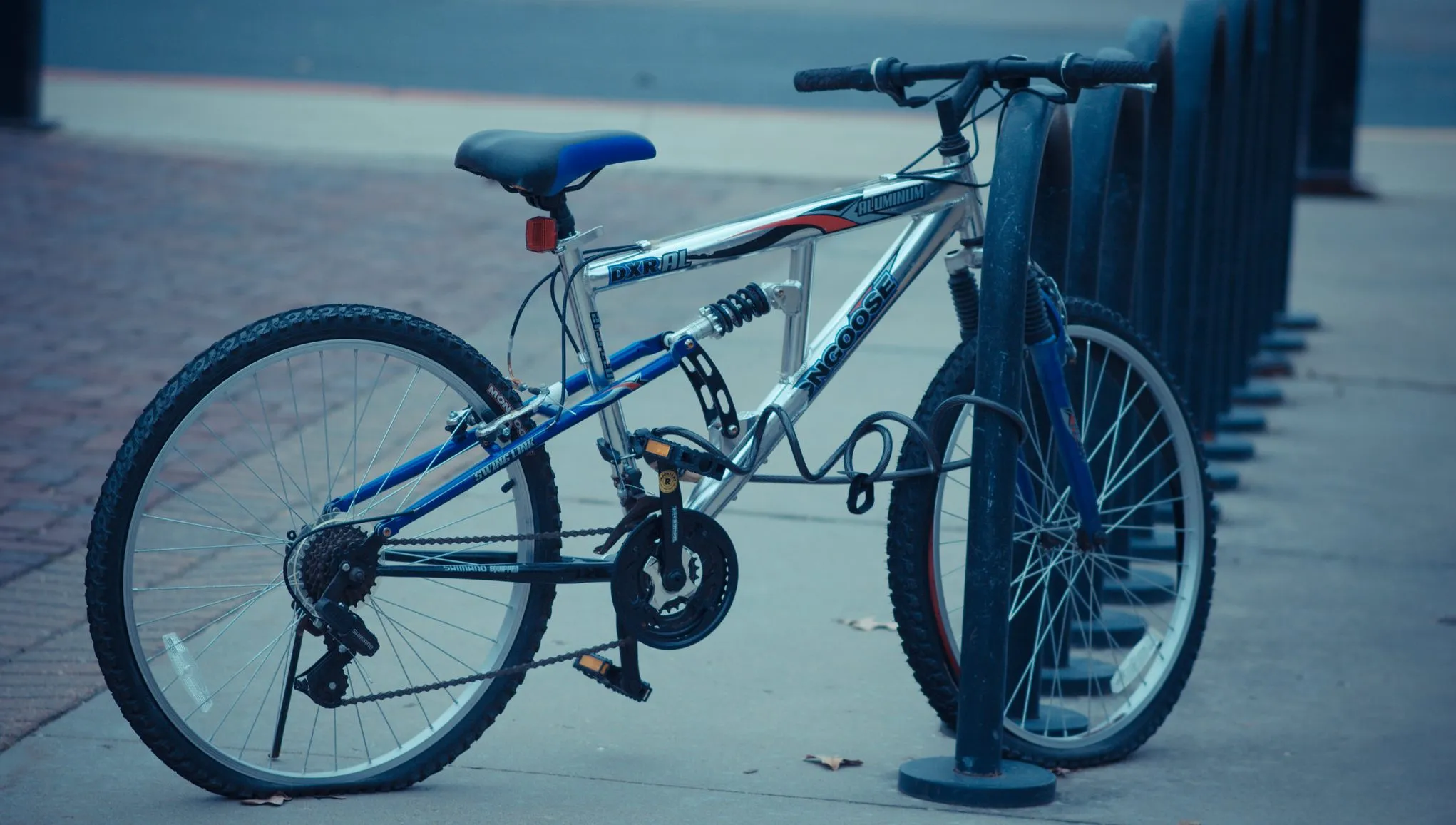 Bicycle wheel and tire being inspected after a repeated flat