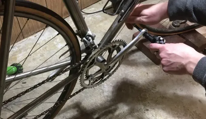 Hex wrench fitted into a bicycle pedal spindle