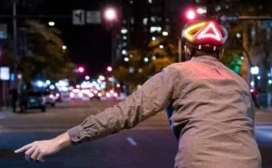 Cycling helmet with integrated front and rear lights