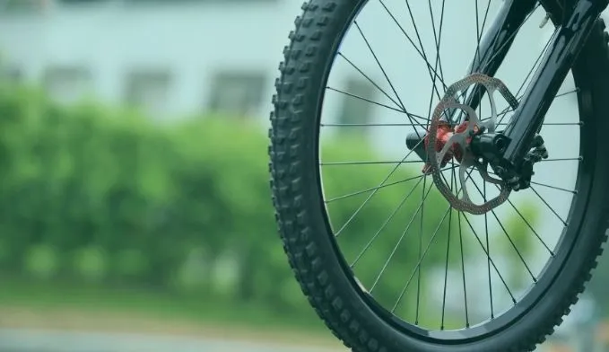 Tire fitted to a motorized bicycle wheel