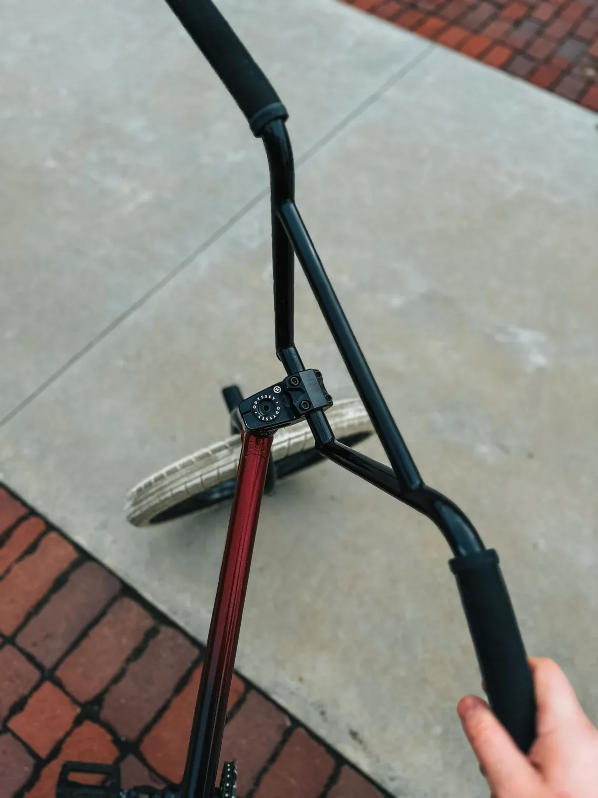 Bicycle handlebars and front wheel seen from above