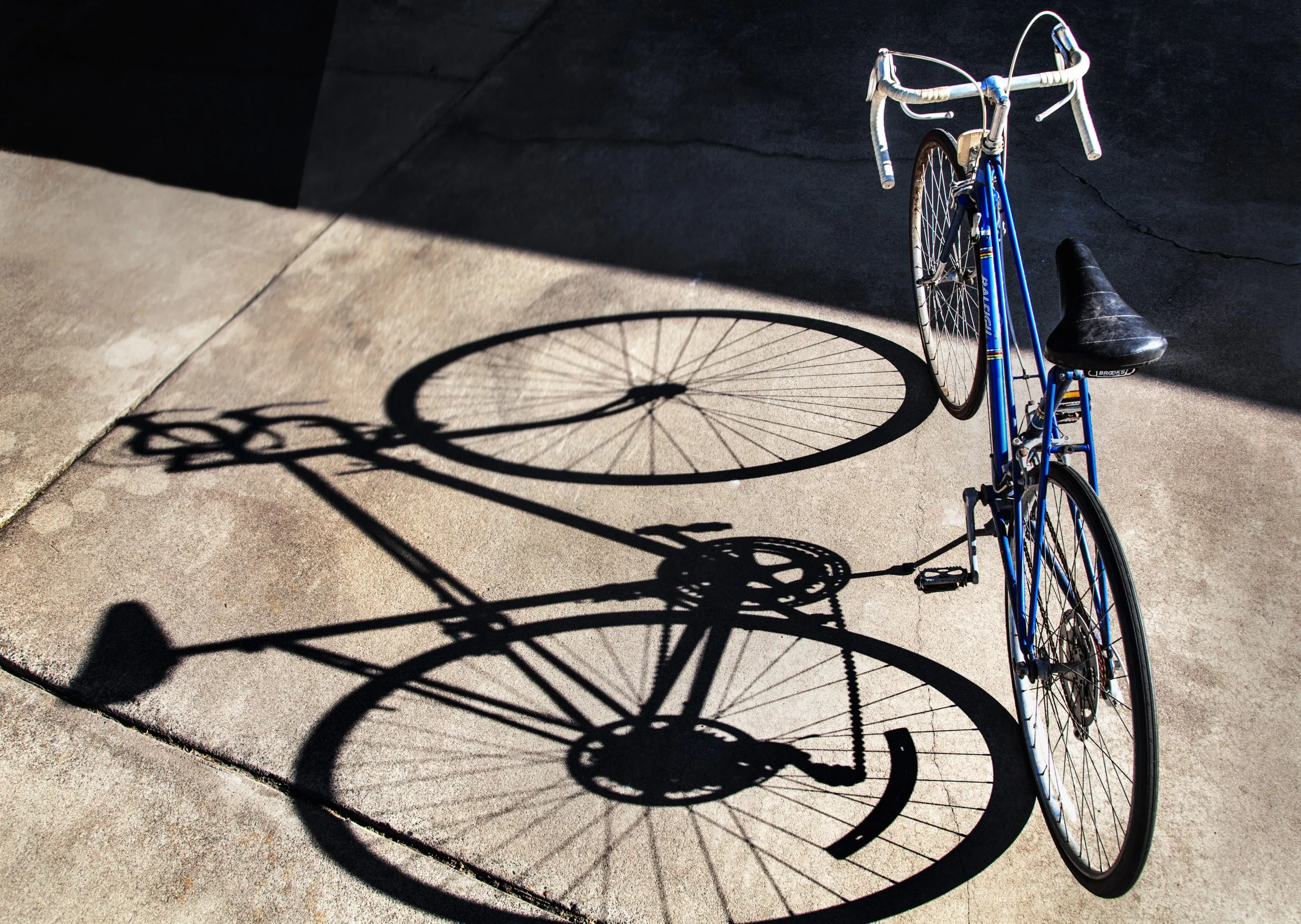 Rear bicycle wheel and tire being checked for a wobble